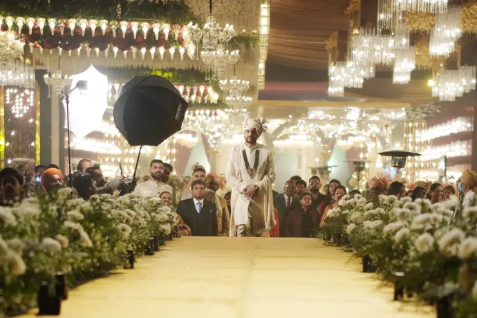 Groom walking on stage